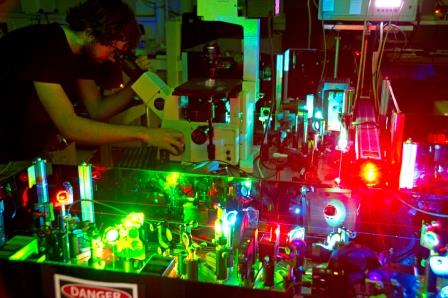 Student looking through a High-Resolution laser microscope